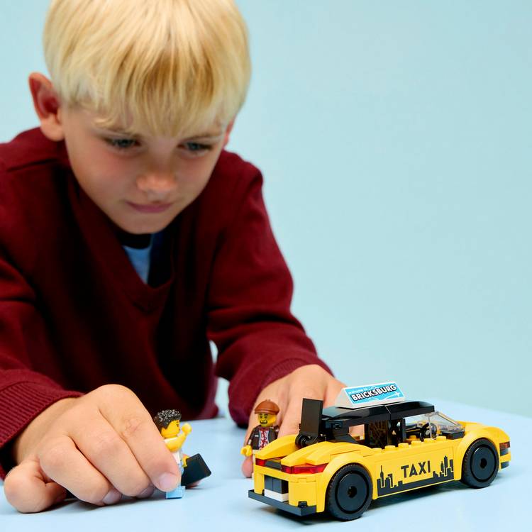 LEGO City Yellow Taxi building set with minifigures, imported from the UK