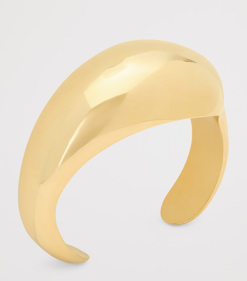 Saint Laurent brass teardrop dome cuff, UK version