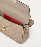 Valentino Garavani Small Rockstud Spike top-handle bag quilted lambskin (British brand)