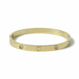 Freedom gold tone heart crystal bangle, imported from the UK