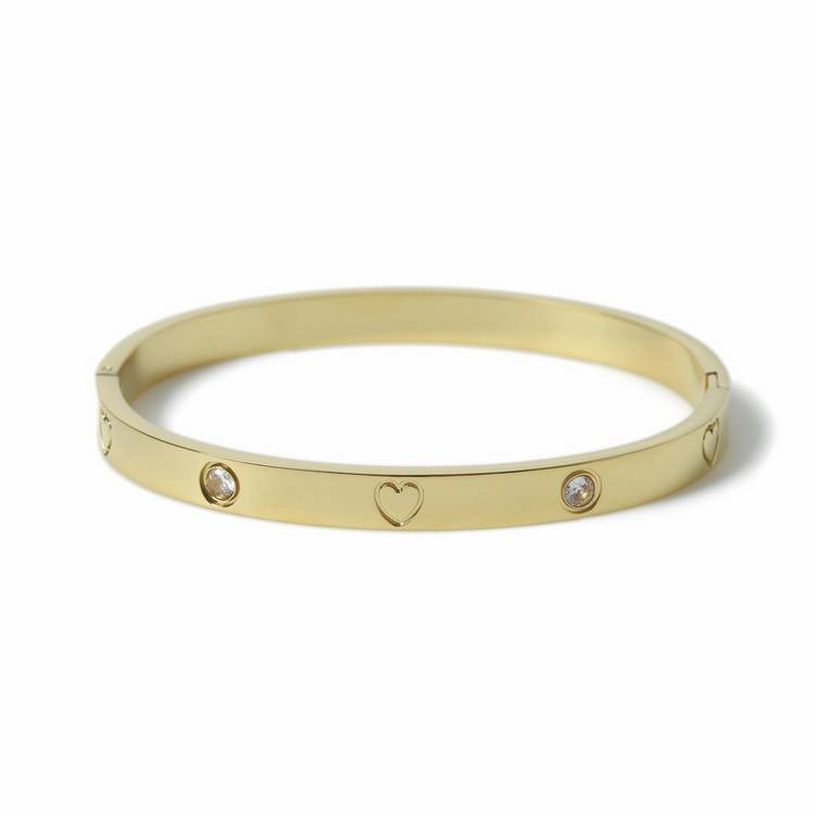 Freedom gold tone heart crystal bangle, imported from the UK