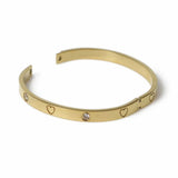 Freedom gold tone heart crystal bangle, imported from the UK
