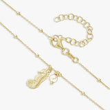 Revere gold-plated seahorse necklace with faux pearl - British product