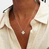 Inicio silver plated mother of pearl clover jewellery set, imported from the UK