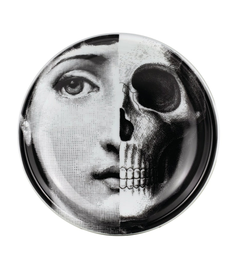 Fornasetti ashtray with face and skull design, number 288, approx. 3.5cm high and 13cm wide - British product