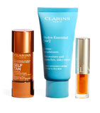 Clarins summer essentials skincare set with radiance drops and lip oil - British product
