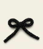 Prada crystal-embellished bow hair clip, UK version