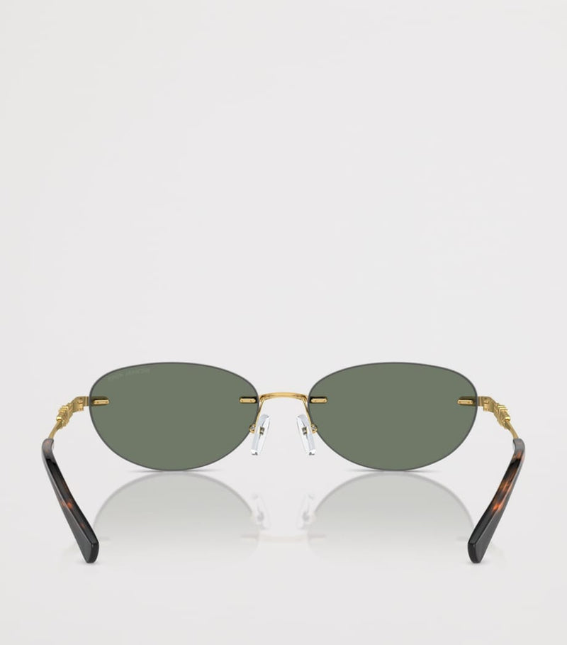Michael Kors Manchester oval sunglasses with gold accents - British product