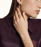 Boucheron Serpent Bohème yellow gold diamond earrings, imported from the UK