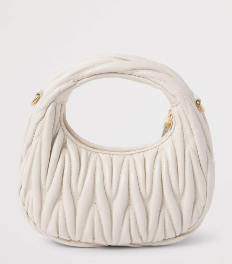 Miu Miu Wander matelassé leather top-handle bag (British brand)