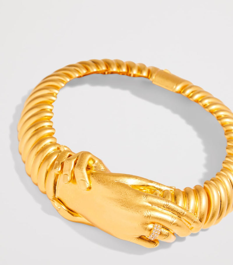 Schiaparelli Hand in Hand necklace, imported from the UK