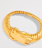 Schiaparelli Hand in Hand necklace, imported from the UK