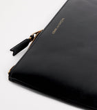 Comme des Garçons large leather zipped pouch - British product