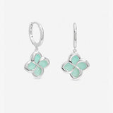 Inicio huggie hoop earrings with turquoise clover, UK version