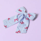 Flitzy gingham hair bow with red bow print, imported from the UK