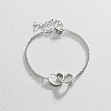 Revere sterling silver two hearts hug bracelet UK version