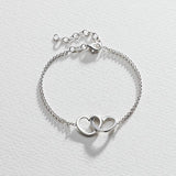 Revere sterling silver two hearts hug bracelet UK version