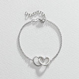Revere sterling silver two hearts hug bracelet UK version
