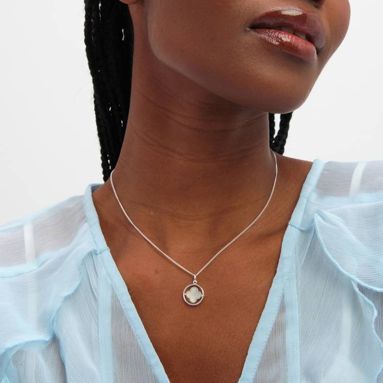 Revere Inicio silver plated mother of pearl spinner clover pendant (British brand)