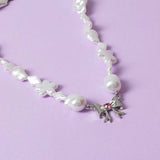 Flitzy kids bow pendant white pearl necklace (British brand)