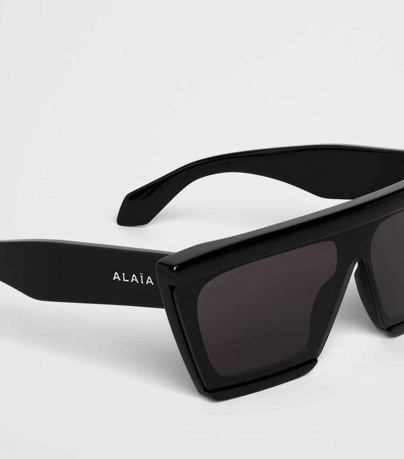 Alaïa Mask 69 acetate rectangle sunglasses, imported from the UK