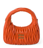 Miu Miu small matelassé leather Wander top-handle bag, UK version