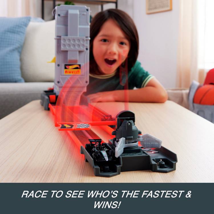 Hot Wheels Formula 1 Grid Start track set with two die-cast cars, UK version