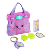 Fisher Price Laugh & Learn learning purse, imported from the UK
