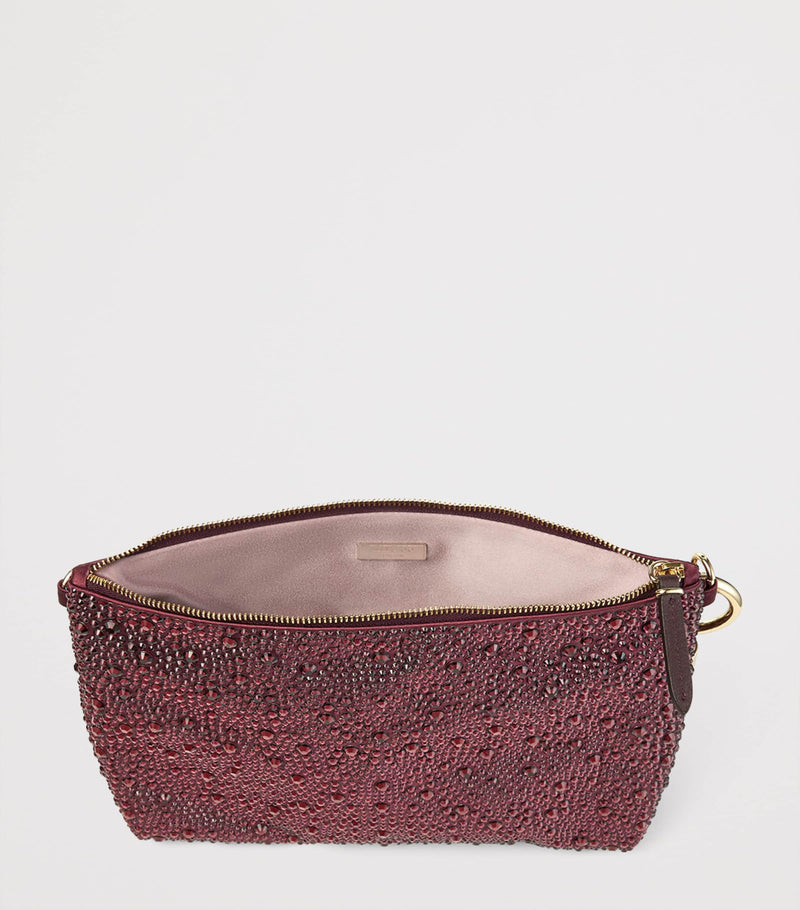 Jimmy Choo crystal-embellished satin clutch bag, imported from the UK
