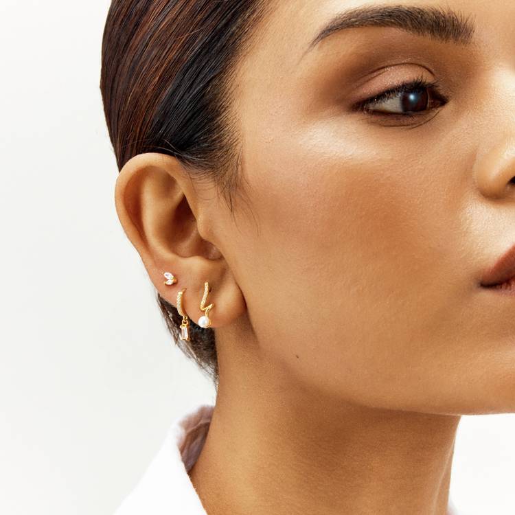 Revere gold plated drop huggie earrings, imported from the UK