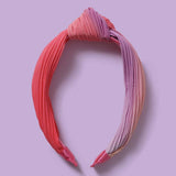 Flitzy knotted headband in pink and purple tones (British brand)