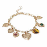 Freedom gold-tone heart charm bracelet 19cm, imported from the UK