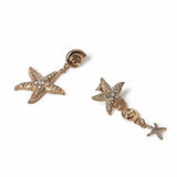 Freedom mismatched drop earrings with starfish and shell charms (British brand)