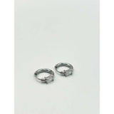 SVNX crystal huggie hoops in silver stainless steel (British brand)