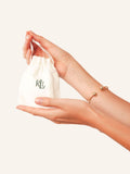 Lauren Ralph Lauren gold tone crest bangle, UK version