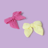 Flitzy pink and yellow bow hair clip set, UK version