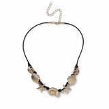 Revere gold-tone shell and starfish necklace on black cord (British brand)