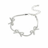 Argos Freedom Silver-tone Three Bows Thin Bracelet- Buy online at McGrocer