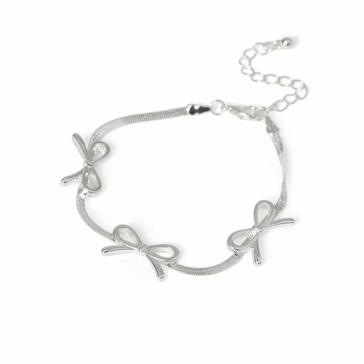 Freedom silver-tone three bows thin bracelet 19cm, imported from the UK