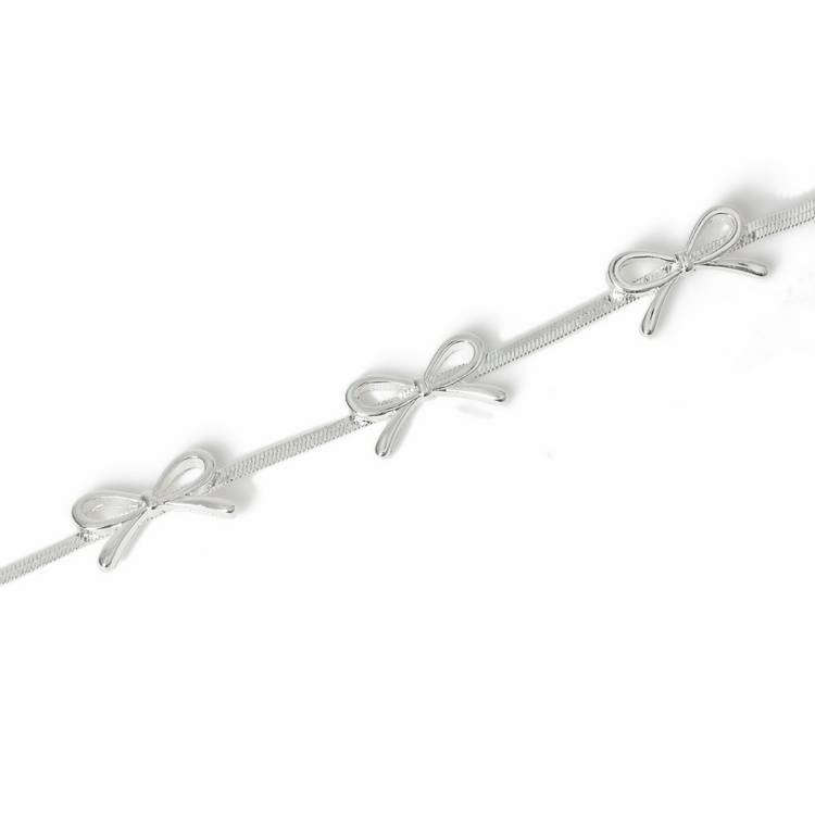 Freedom silver-tone three bows thin bracelet 19cm, imported from the UK