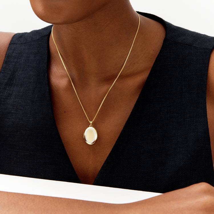 Revere gold plated oval locket pendant necklace, imported from the UK