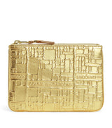 Harrods Comme des Garçons Wallet Leather Embossed Logo Zipped Pouch- Buy online at McGrocer