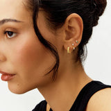 Revere gold plated ribbed hoop earrings, imported from the UK