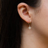 Revere gold North Star drop earrings, UK version