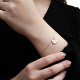Revere 9ct yellow gold heart bracelet 19cm, imported from the UK