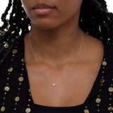 Revere gold mini cross necklace with cubic zirconia stones, UK version