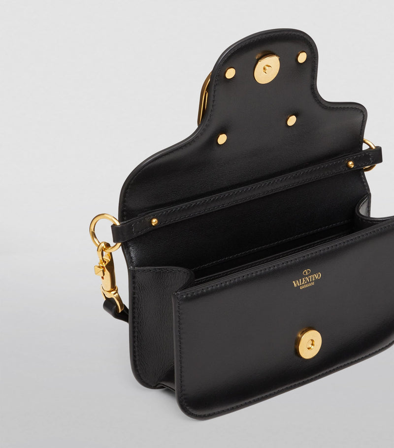 Valentino Garavani small leather Locò shoulder bag, imported from the UK