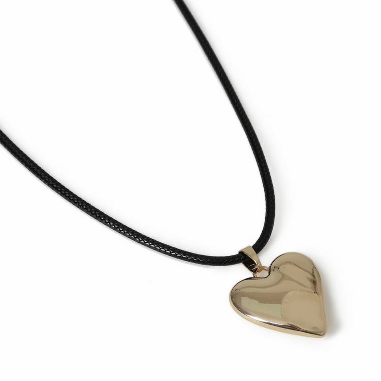 Revere gold heart pendant necklace with black cord, imported from the UK