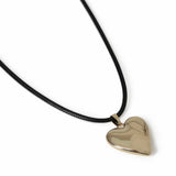 Revere gold heart pendant necklace with black cord, imported from the UK