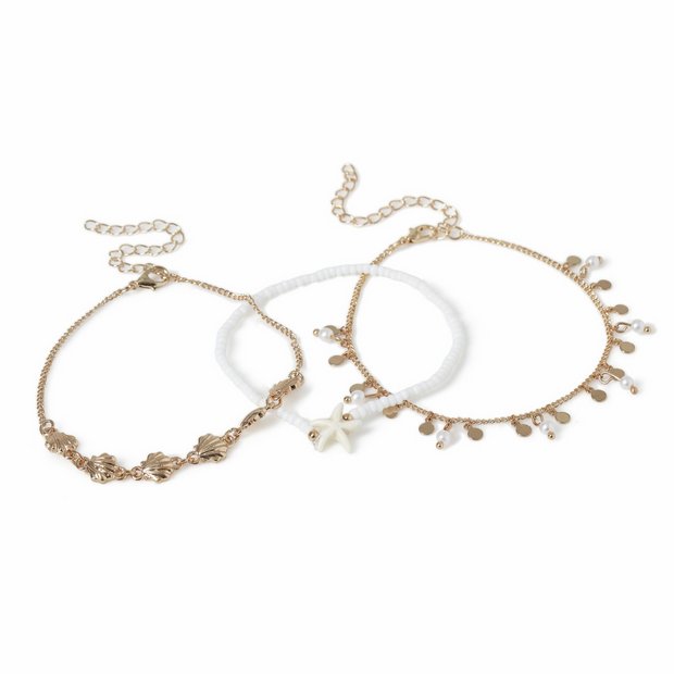 Freedom gold tone shell, bead, starfish bracelet set, UK version